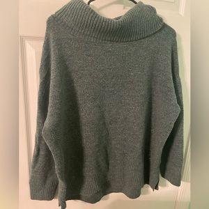 Light green turtleneck sweater. Lightly worn